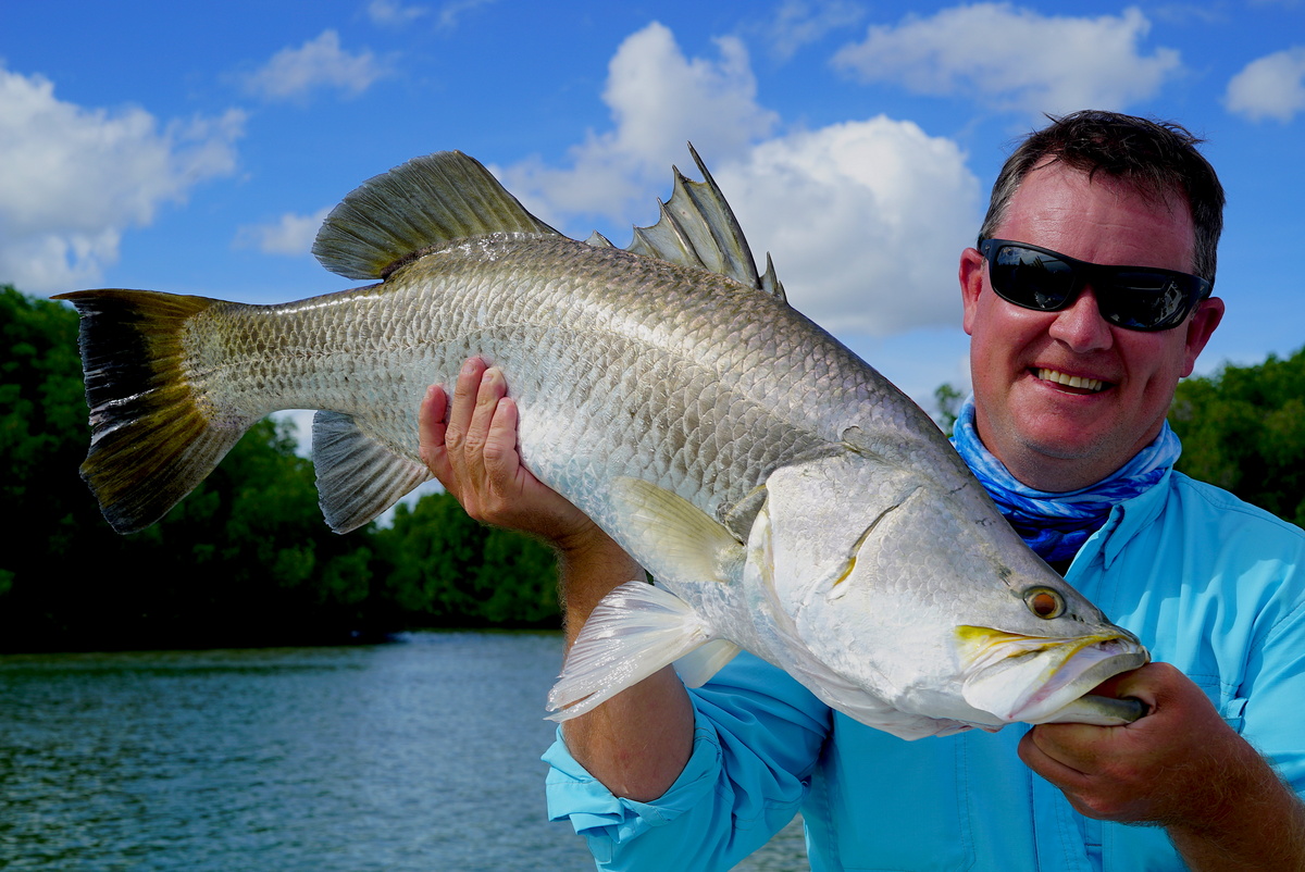 Justin with Barramundi Caught on Nomad Vibe